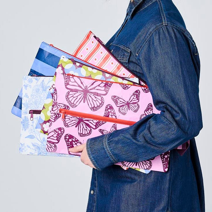 Someone holding 5 Pencil Cases in Wallpaper, Mosaic, Toile, Blue Stripe & Butterfly.
- Project Ten