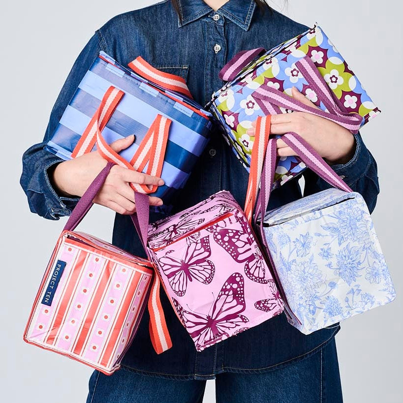 Someone holding 5 Mini Insulated Totes in Wallpaper, Butterfly, Toile, Mosaic & Blue Stripe.
- Project Ten