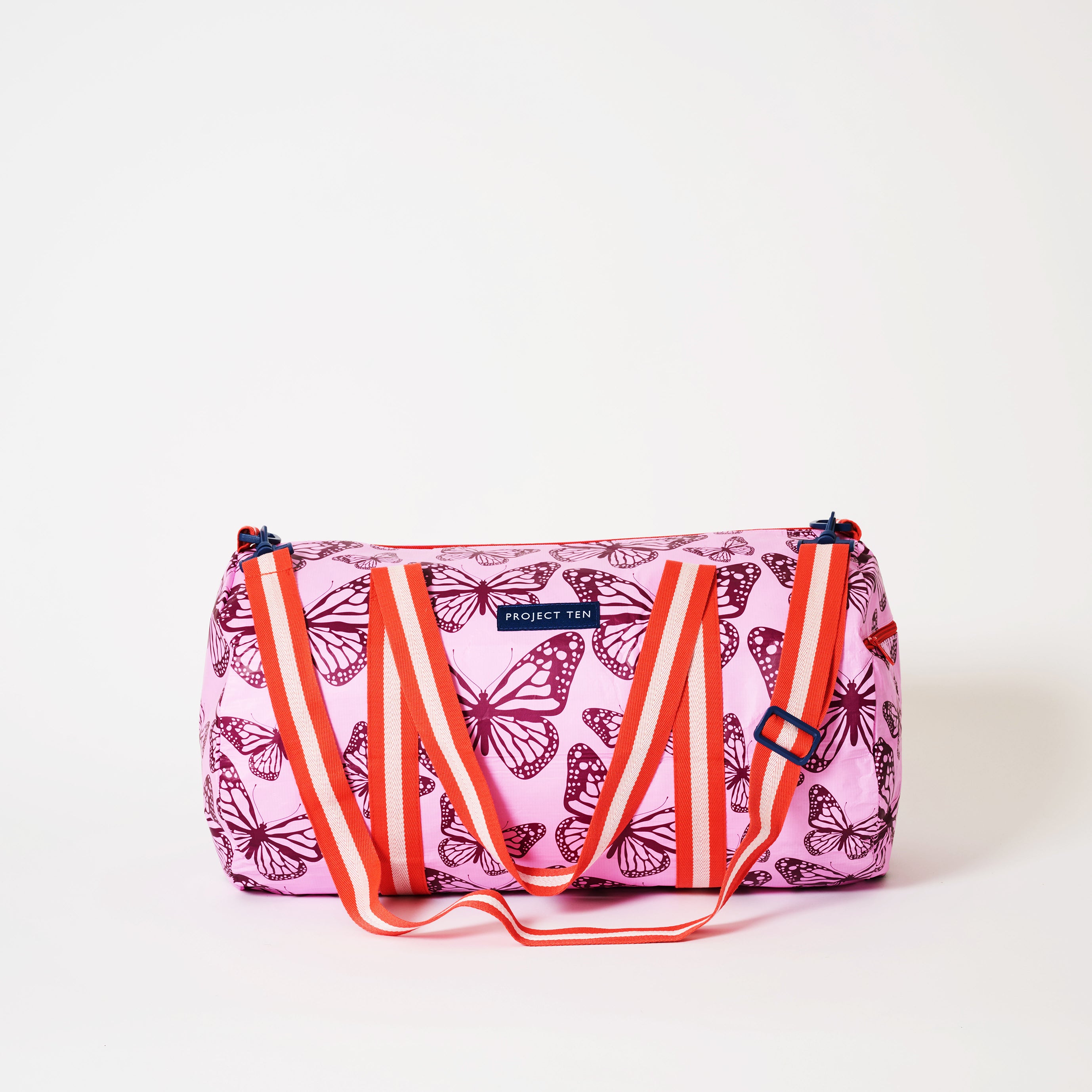 Barrel Bag in Butterfly, with soft woven shoulder strap and handles.
- Project Ten