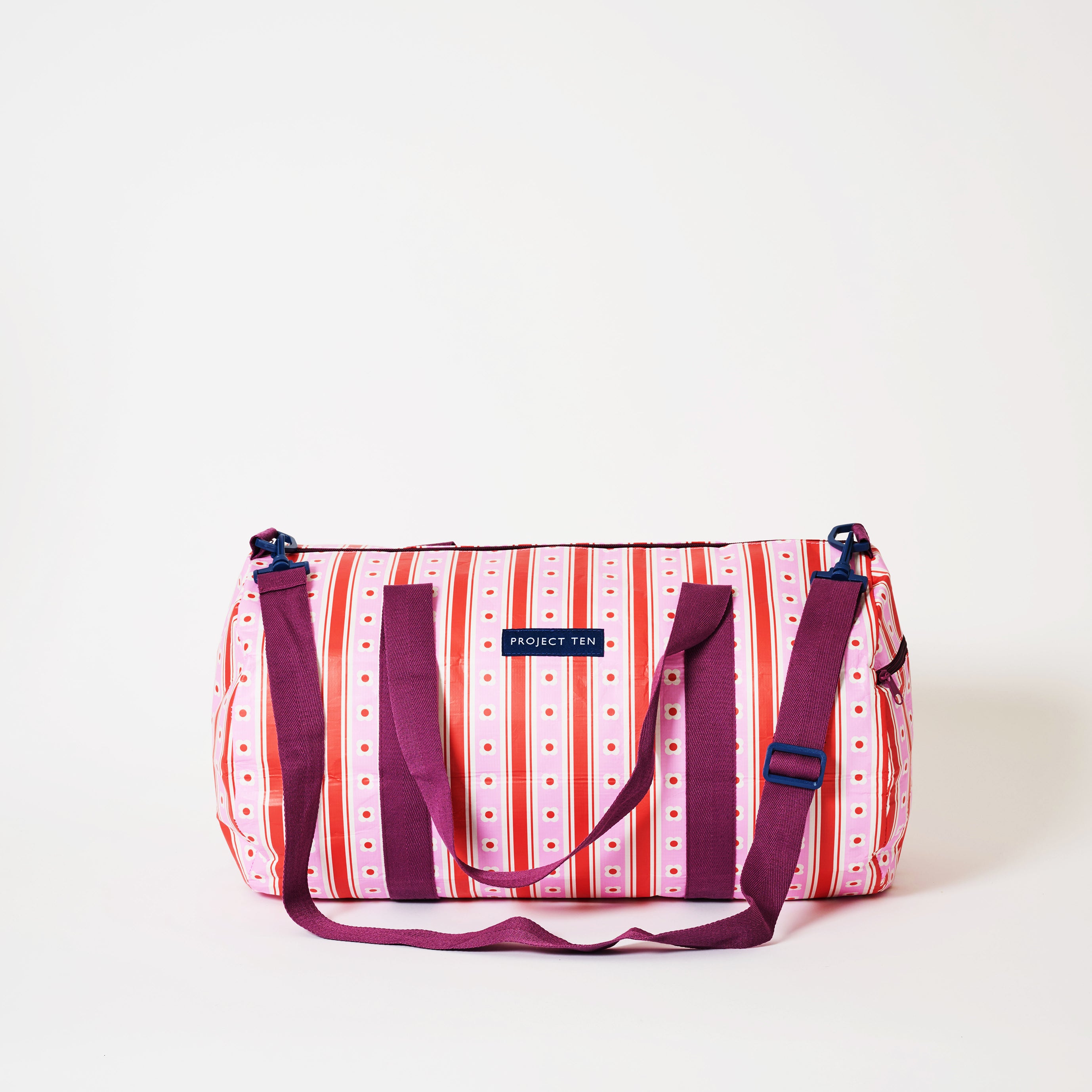 Barrel Bag in Wallpaper pattern with soft woven shoulder strap and handles.
- Project Ten