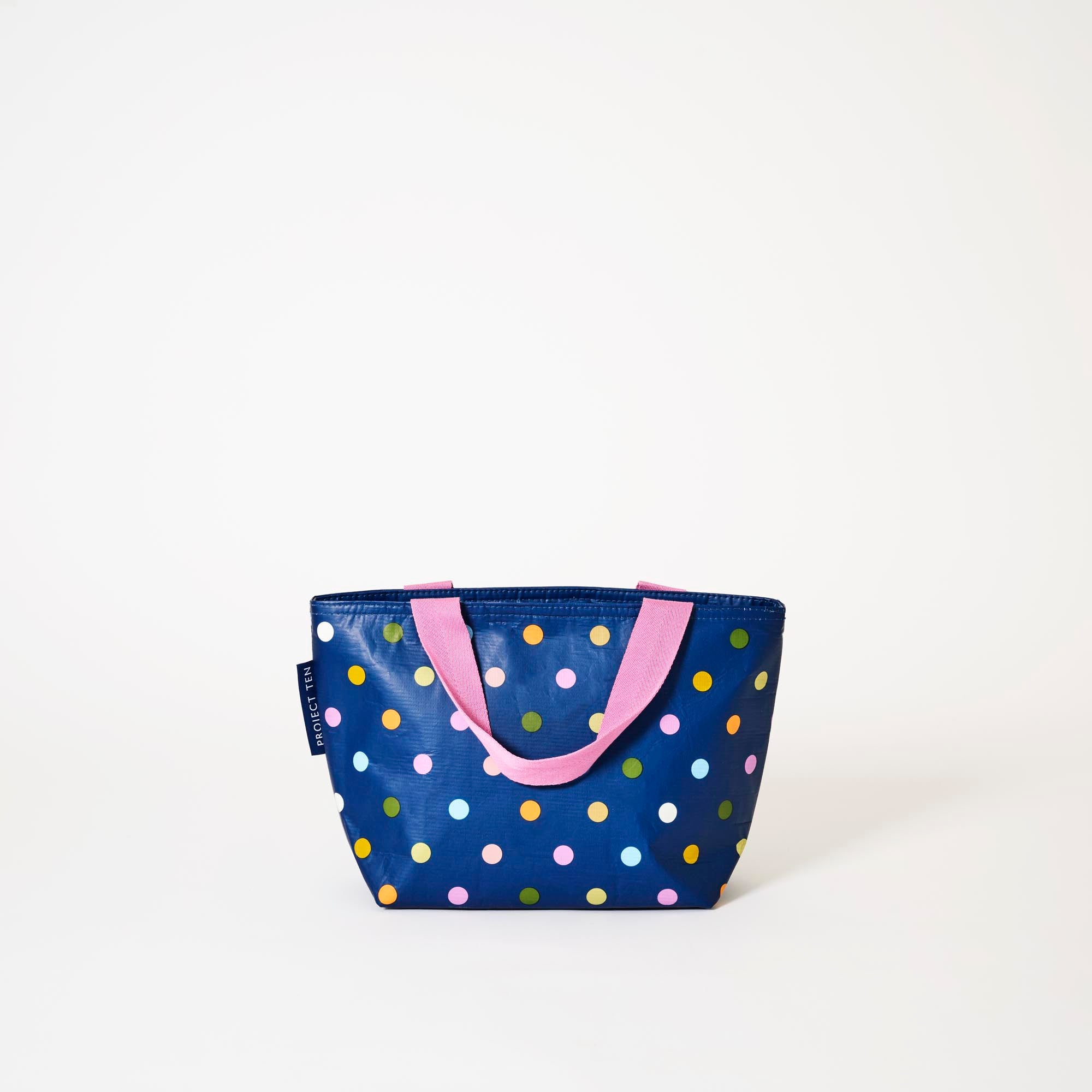Mini Tote – Confetti
Polka dots on navy background
Project Ten