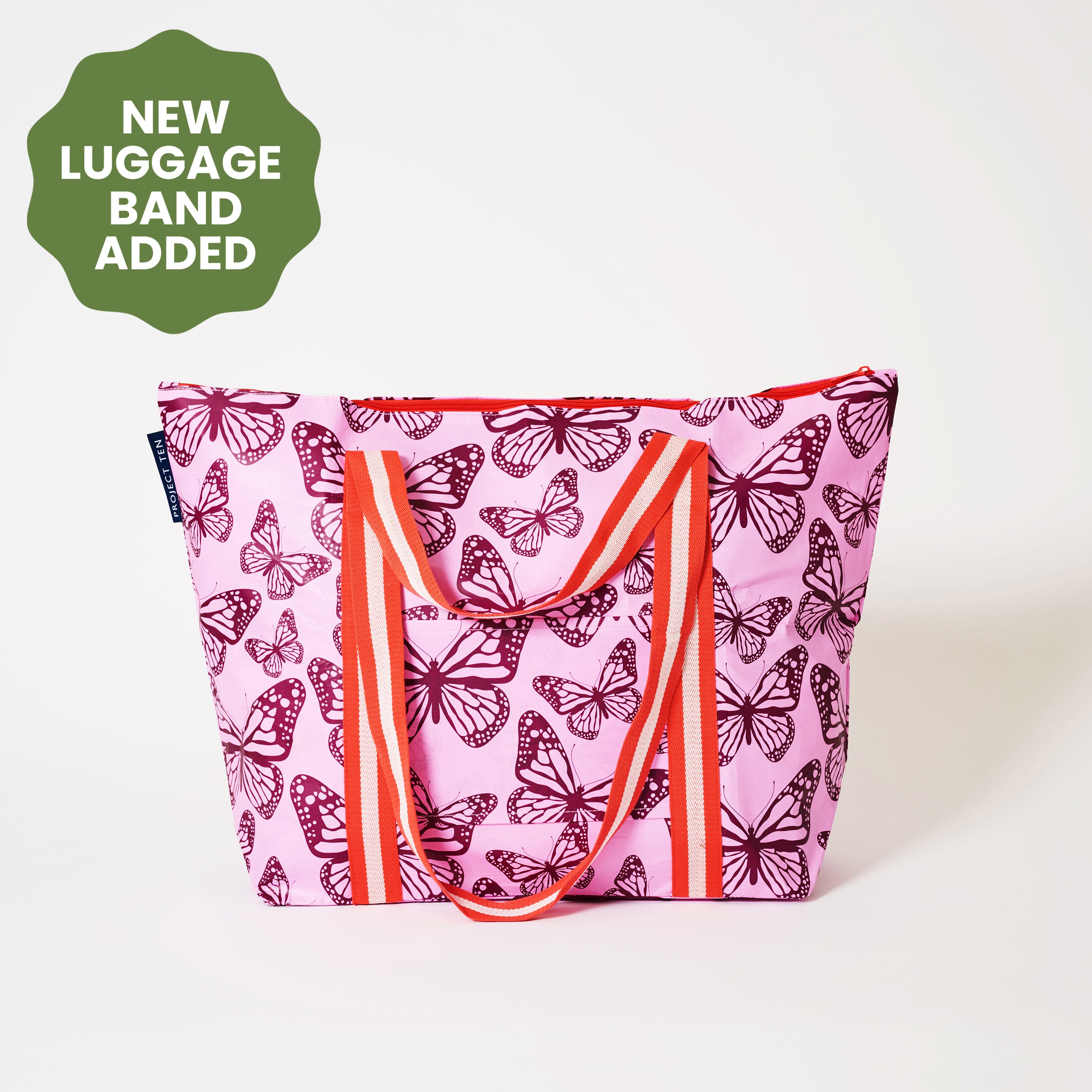 Zip Medium Tote with soft woven shoulder strap and handles, in Butterfly.
- Project Ten