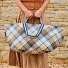 Someone holding the Oversized Tote – Country Plaid - Project Ten