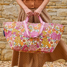 Someone holding the Oversized Tote in Hydrangea using the double handle 
- Project Ten