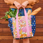 Someone holding the Shopper Tote Splice – Hydrangea merged with our confetti print - Project Ten

