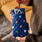 Person holding glasses case. Double Glasses Case – Confetti - Project Ten