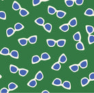 Our Sunglasses pattern in green with a scattered print of ecru framed sunglasses with blue lenses.