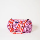 Barrel Bag with soft woven shoulder strap and handles in Butterfly  The image also shows a zip compartment on the end of the Barrel Bag.  
- Project Ten