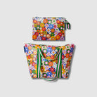 Our Coastal Floral Large Zip Pouch and Zip Medium Tote Bundle, a Zip Medium Tote and a matching Large Zip Pouch in a retro daisy print of orange, red, pink, yellow, blue and white flowers on a navy background, with green and pink striped carry handles and a loop tab.