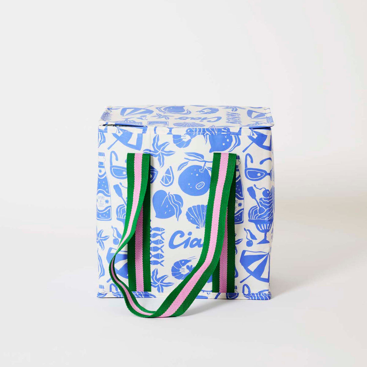 Feast Medium Insulated

Our Feast Medium Insulated Tote, in a blue and ecru print of lemons, seafood, gelato, soda bottles, sunglasses, beach umbrellas and the word "Ciao", with a fold-over zip lid and long green and pink striped straps.