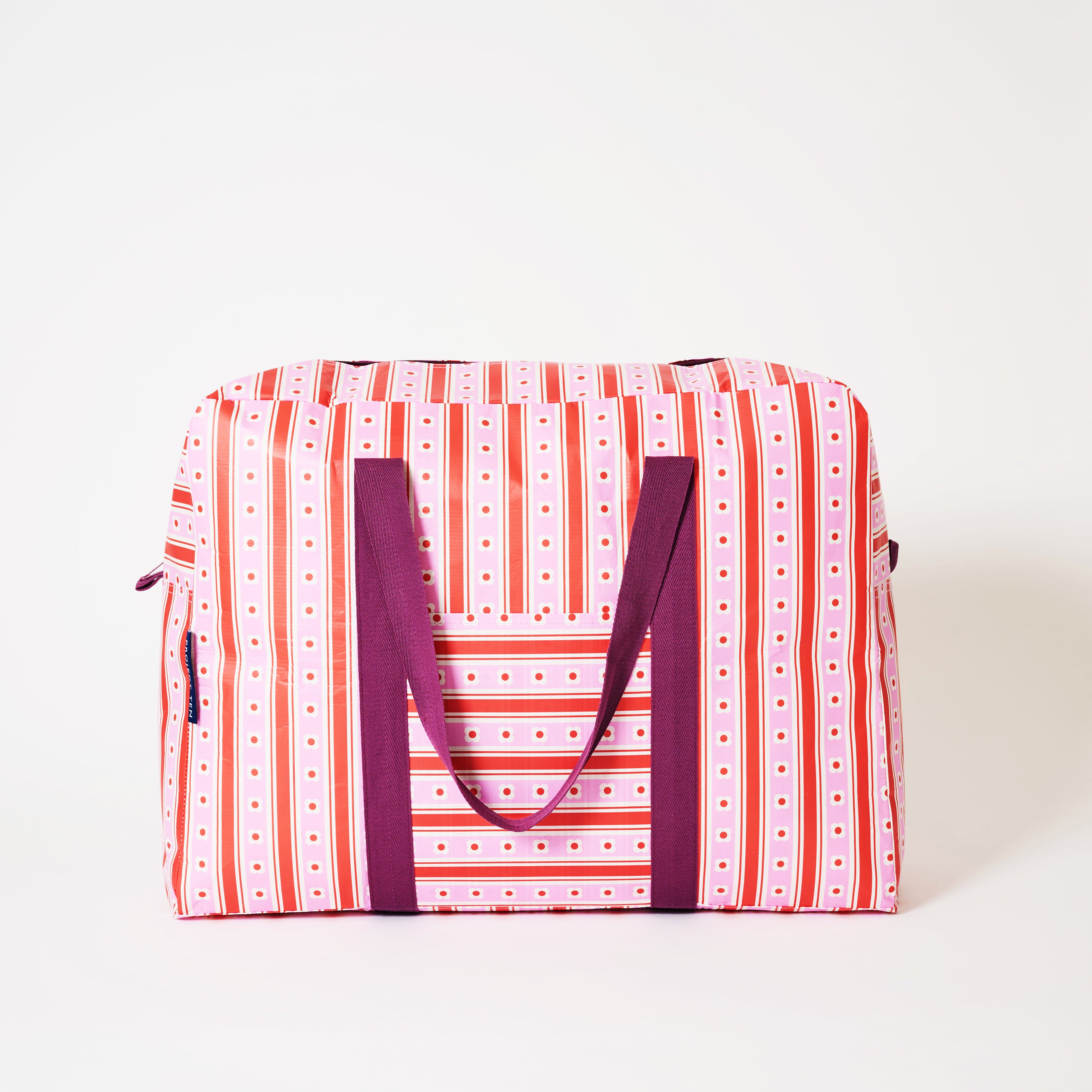 Overnight bag in Wallpaper with soft woven handles. 