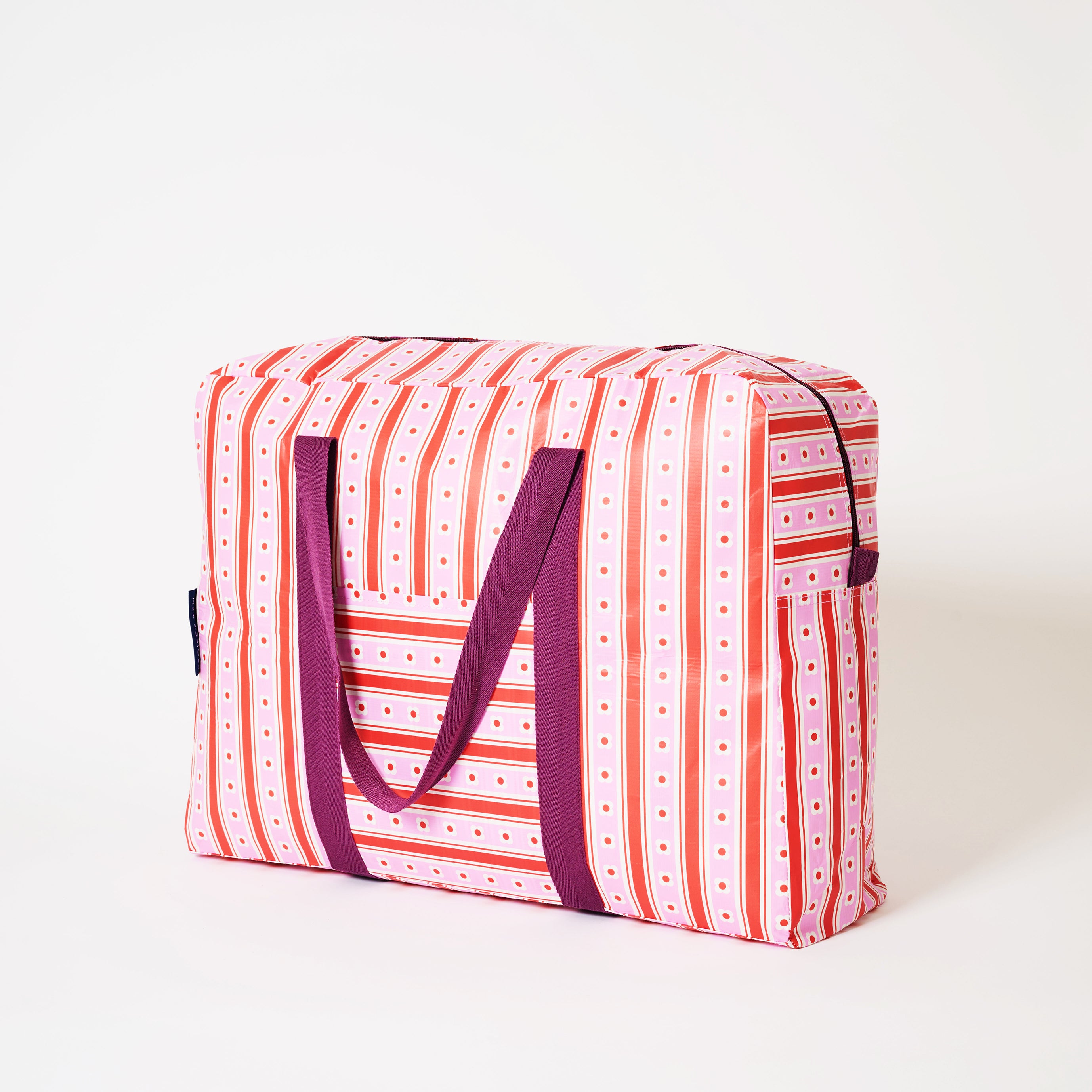 Overnight bag in Wallpaper with zip and soft woven handles.
- Project Ten