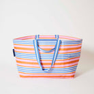 Our Capri Stripe Oversized Tote in horizontal stripes of pink, orange, blue and ecru with blue and white striped straps, shown open against a plain background.
