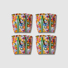 Our Coastal Floral Shopper Tote Bundle, a set of four Shopper Totes in a retro daisy print of orange, red, pink, yellow, blue and white flowers on a navy background, each with green and pink striped carry handles.