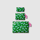 Our Sunglasses Zip Pouch Bundle, a set of three Zip Pouches in small, medium and large in green with a scattered print of blue-lensed, white-framed sunglasses, with pink loop tabs on the medium and large pouches.