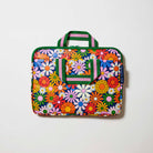 Our Coastal Floral Laptop Case, a slim zip-up laptop case in a retro daisy print of orange, red, pink, yellow, blue and white flowers on a navy background, with two green and pink striped carry handles and a green zip.