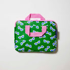 Our Sunglasses Laptop Case, a slim zip-up laptop case in green with a scattered print of blue-lensed, white-framed sunglasses, two pink carry handles and a pink zip.