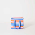 Our Capri Stripe Mini Insulated Tote, a small boxy cooler bag in horizontal stripes of pink, orange, blue and ecru, a fold-over zip lid and short blue and ecru striped carry handles.