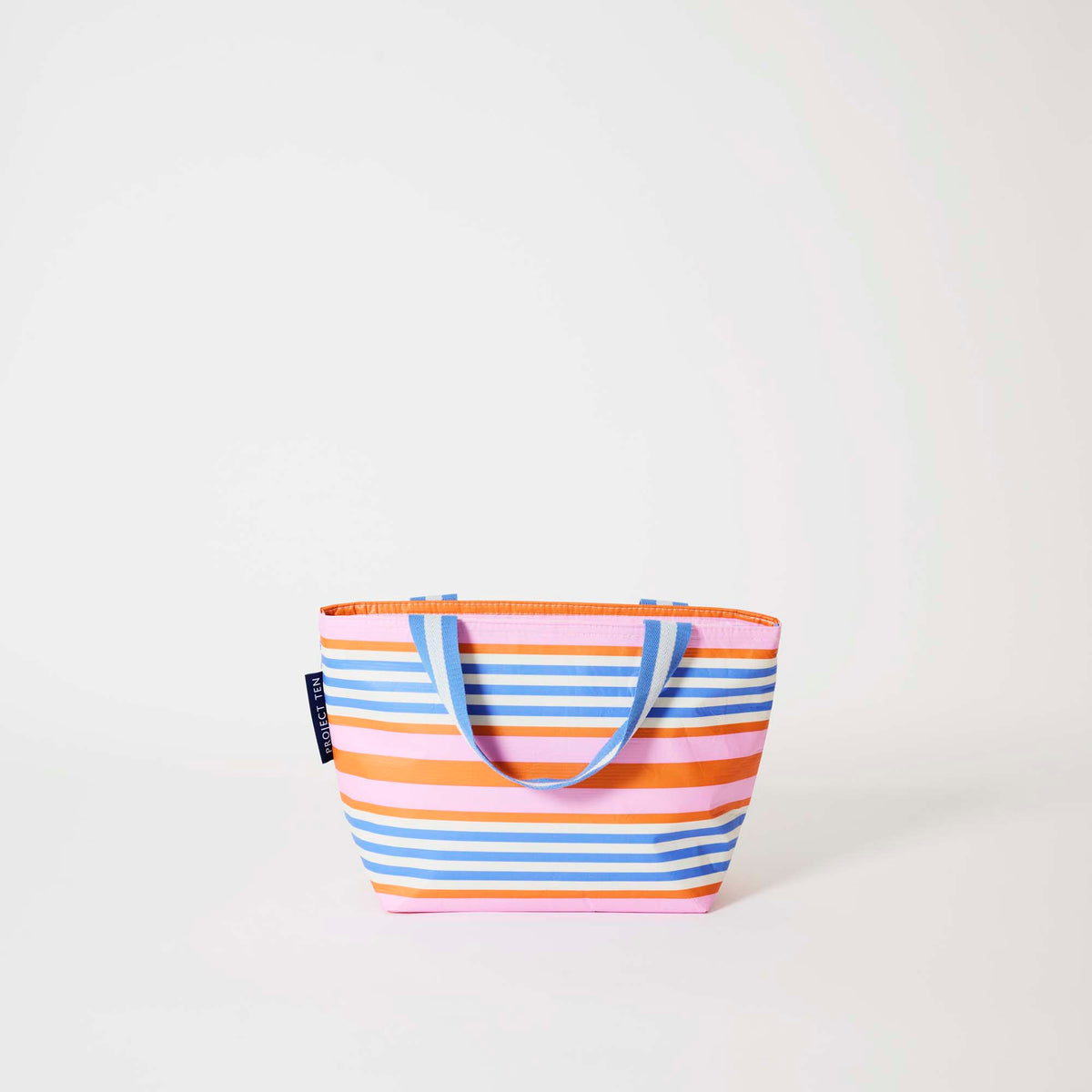 Our Capri Stripe Mini Tote, a compact tote bag in pink, orange, blue and ecru horizontal stripes with two blue and ecru striped carry handles.