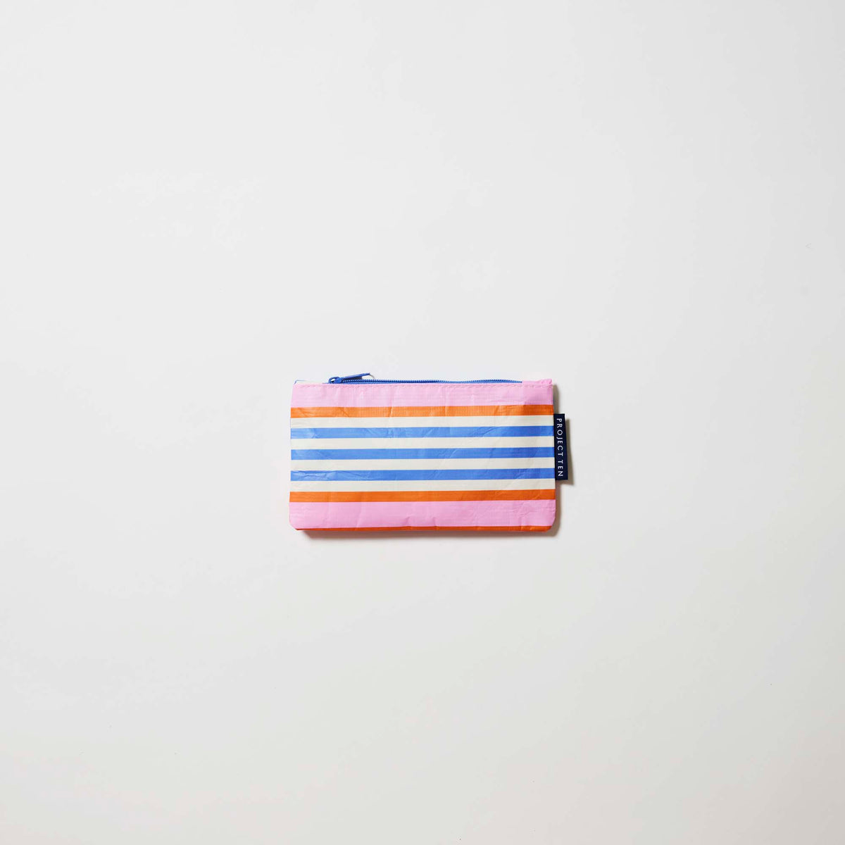 Our Capri Stripe Tiny Zip Pouch, a small flat pouch in horizontal stripes of pink, orange, blue and ecru, with a blue zip.