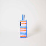 Our Capri Stripe Wine Bag, a tall narrow bottle bag in pink, orange, blue and ecru horizontal stripes with a blue trim and a single blue and ecru striped carry handle.
